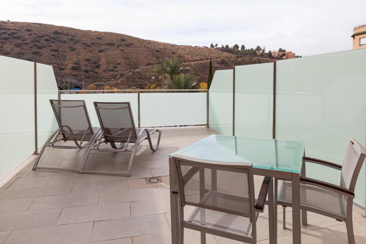 Un balcón o terraza de Hotel Macià Real De La Alhambra