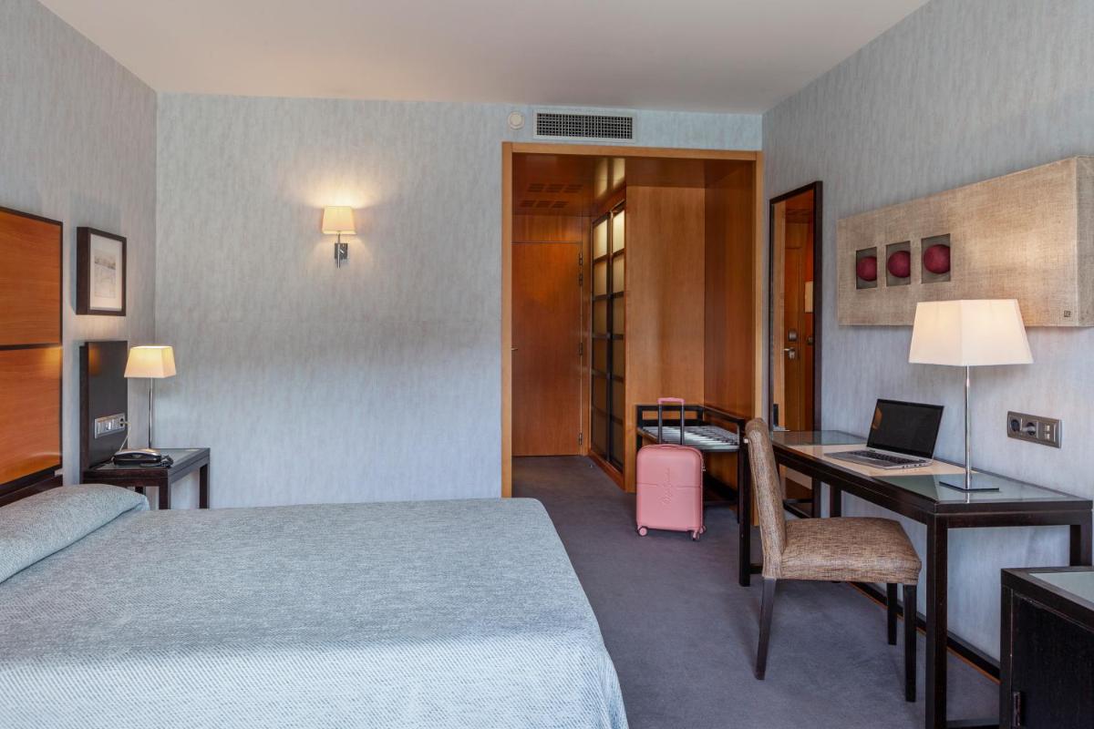 Cama o camas de una habitación en Hotel Macià Real De La Alhambra