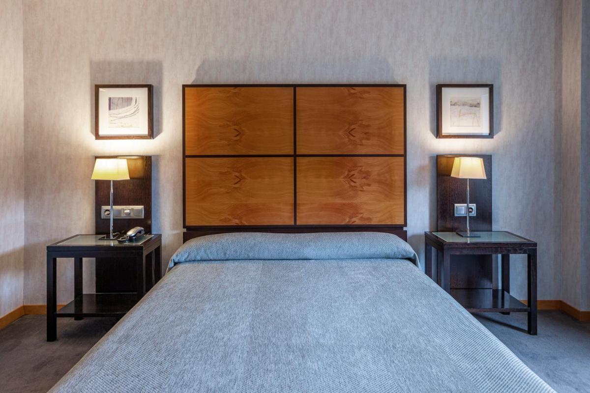 Cama o camas de una habitación en Hotel Macià Real De La Alhambra