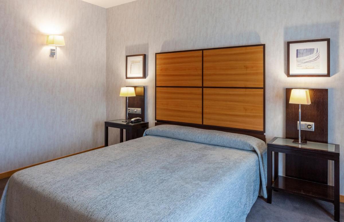 Cama o camas de una habitación en Hotel Macià Real De La Alhambra