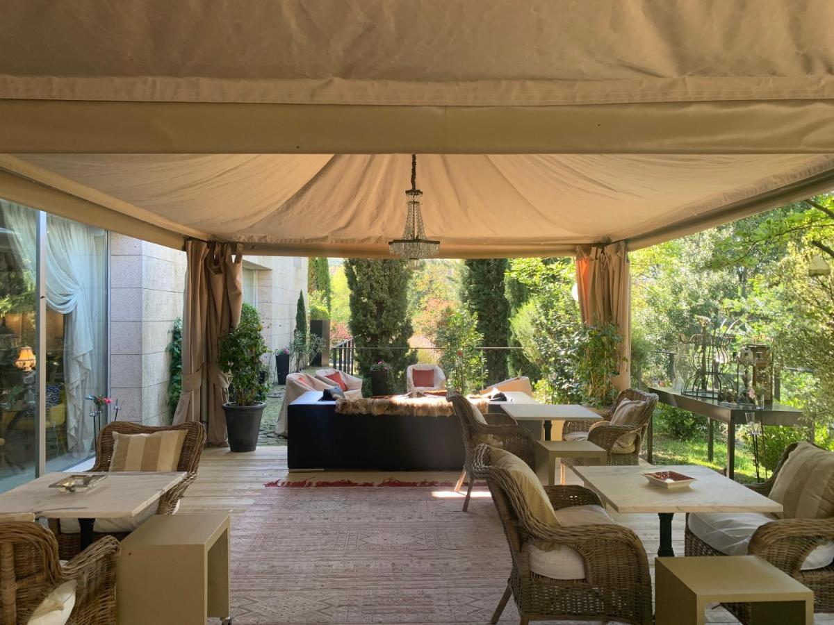 Uma área de estar em Carmo's Boutique Hotel - Small Luxury Hotels of the World