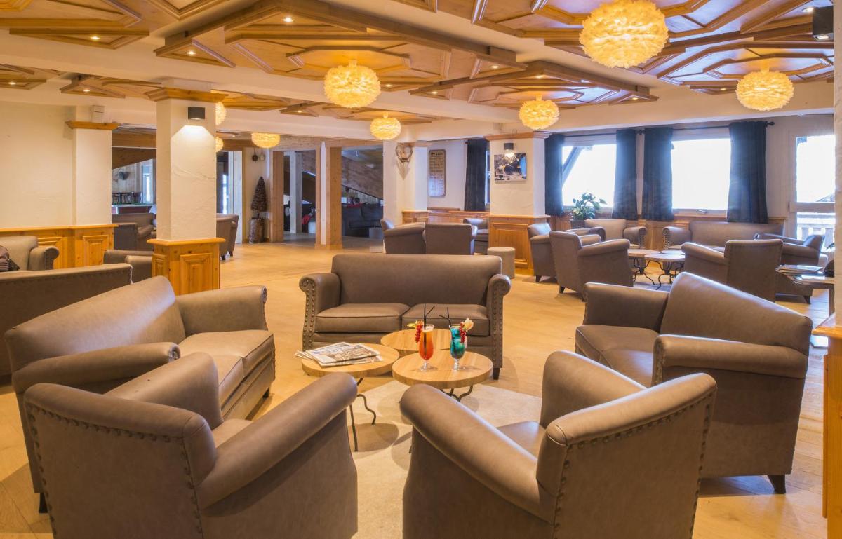Coin salon dans l'établissement Hotel le Petit Dru