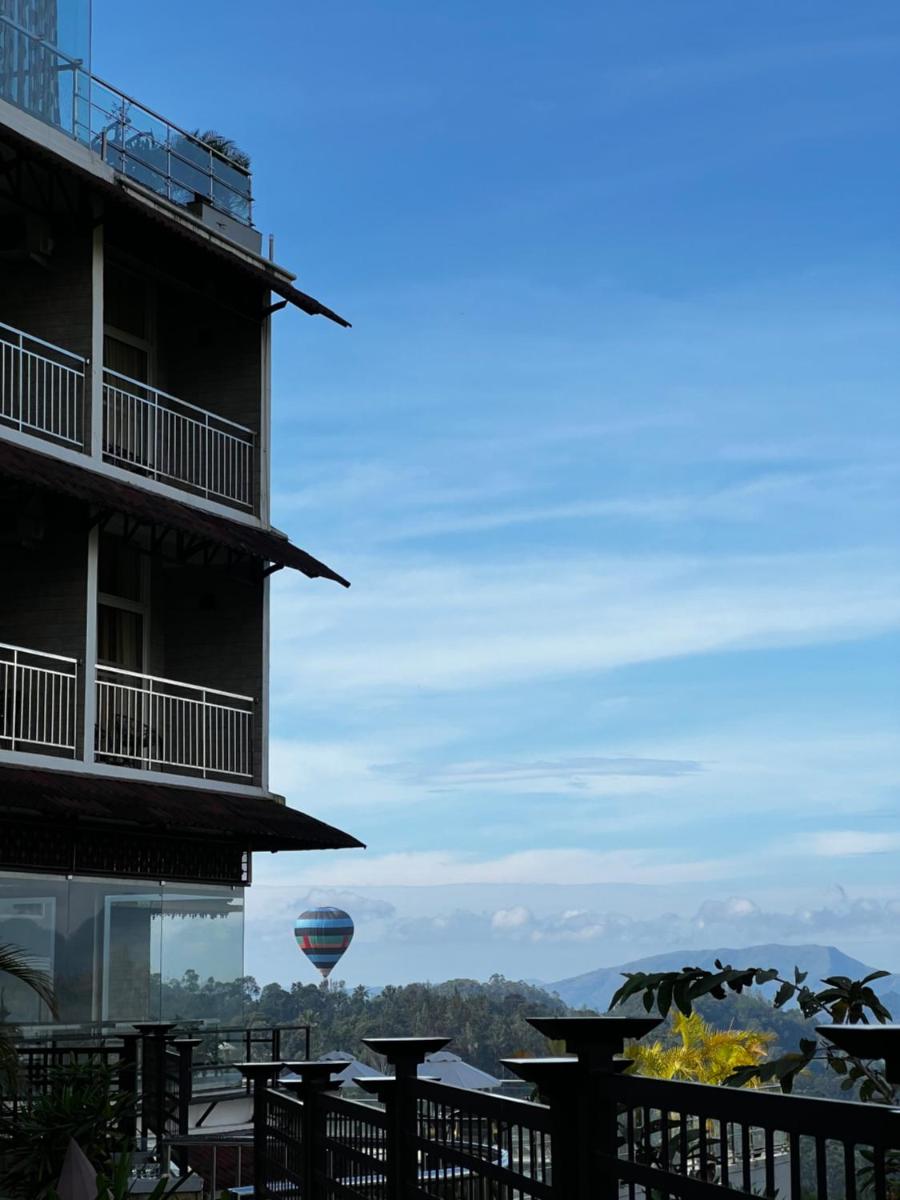 a view of a hot air balloon from a hotel at The Panoramic Getaway in Munnar