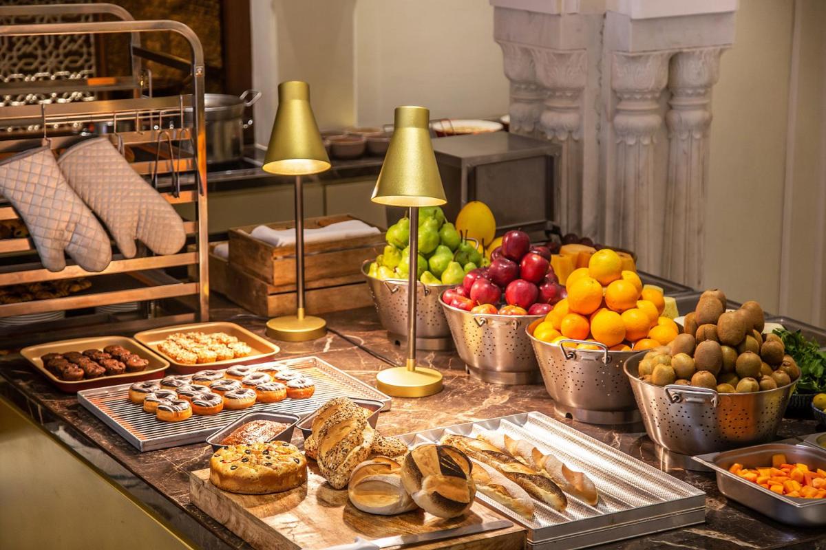 a buffet filled with different types of fruits and vegetables at Hyatt Regency Jaipur Mansarovar in Jaipur a buffet filled with different types of fruits and vegetables at Hyatt Regency Jaipur Mansarovar in Jaipur