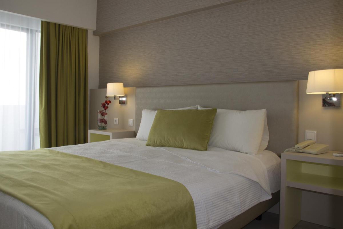 Uma cama ou camas num quarto em Hotel Navegadores