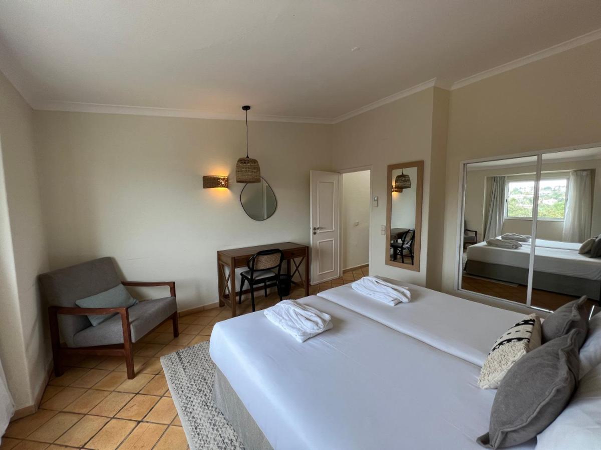 Uma cama ou camas num quarto em Pestana Palm Gardens
