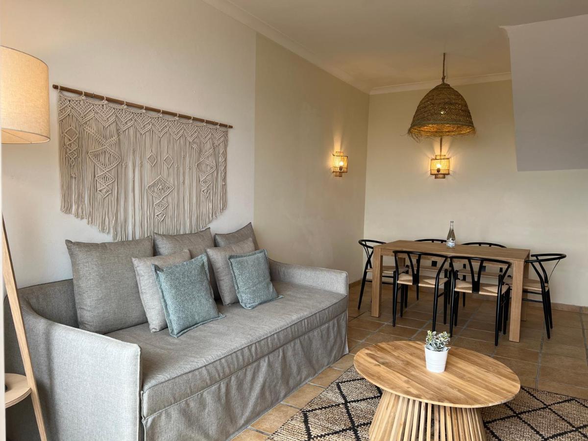 Uma área de estar em Pestana Palm Gardens