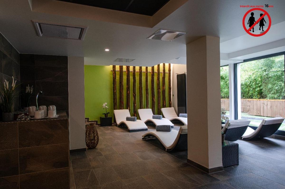Coin salon dans l'établissement Europe Haguenau – Hotel & Spa