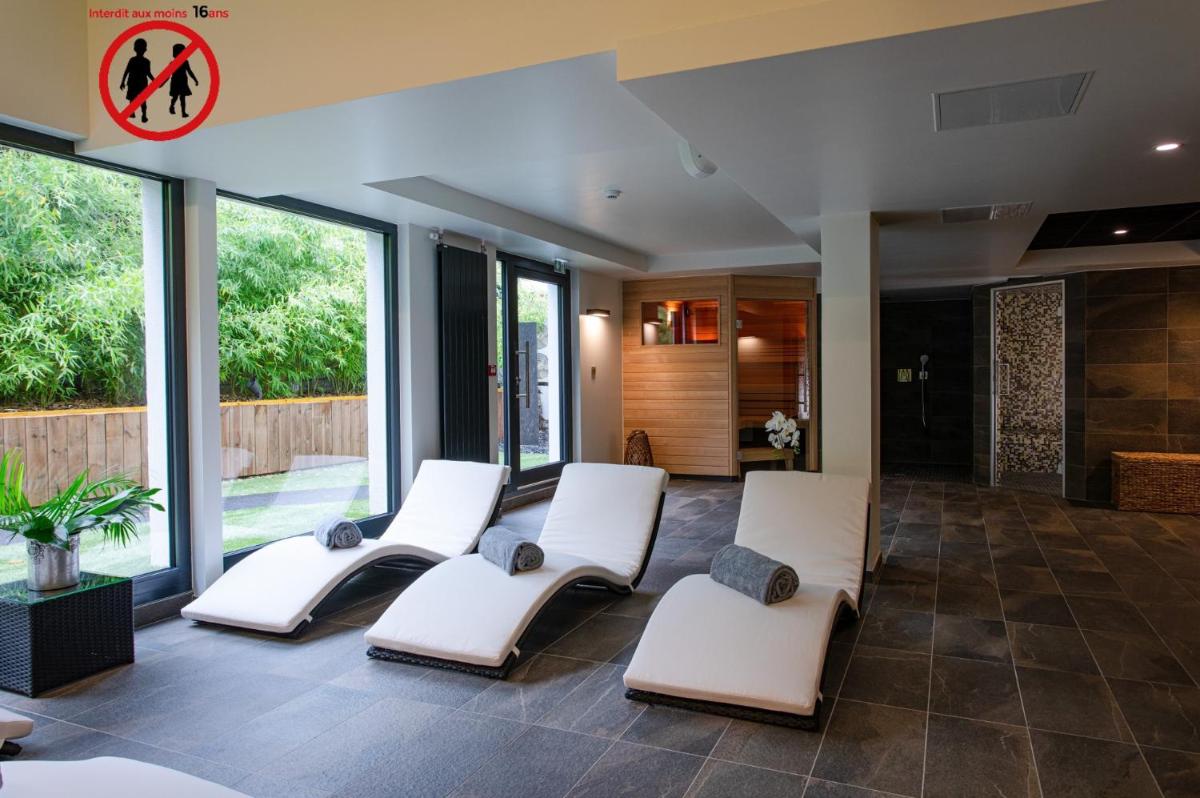 Coin salon dans l'établissement Europe Haguenau – Hotel & Spa