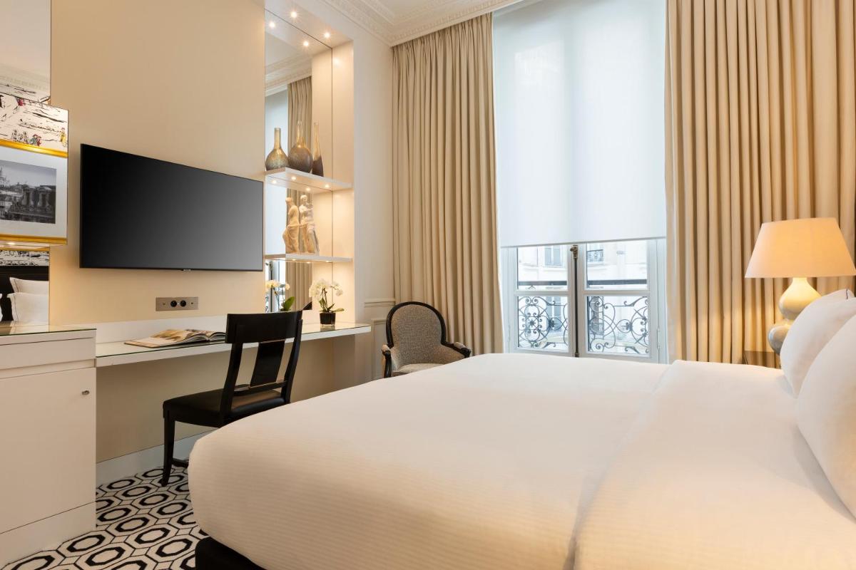 Télévision ou salle de divertissement dans l'établissement Hôtel Keppler
