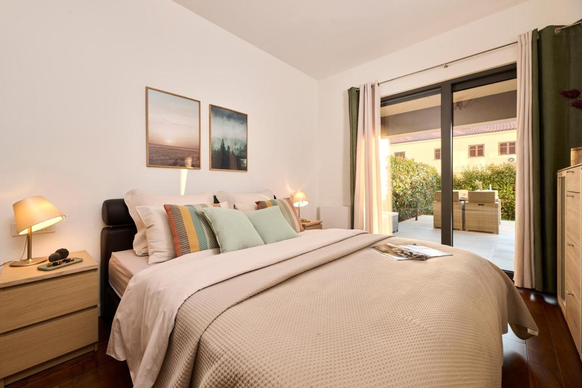 Spada brand new apartment with garden 3 min from beach! - Housity