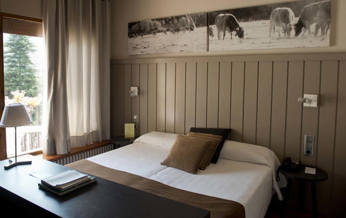 Cama o camas de una habitación en Hotel Restaurant Pessets & SPA