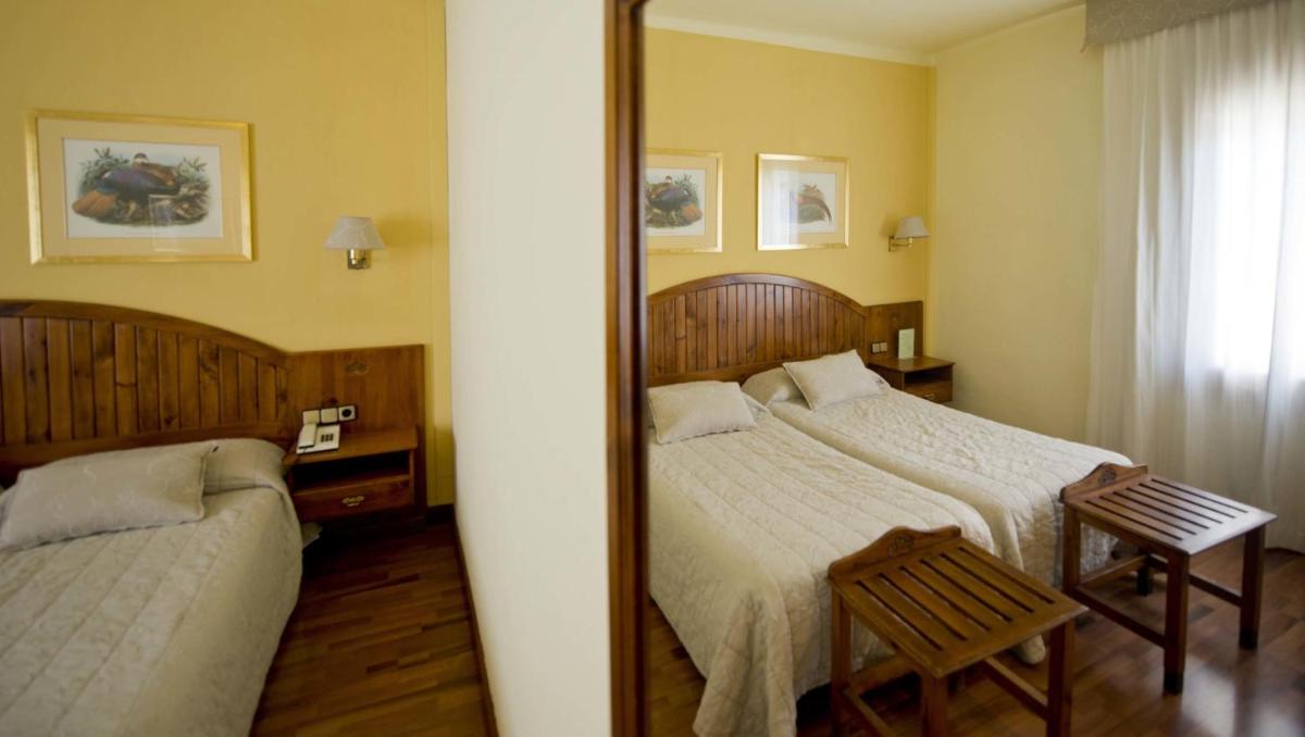 Cama o camas de una habitación en Hotel Restaurant Pessets & SPA