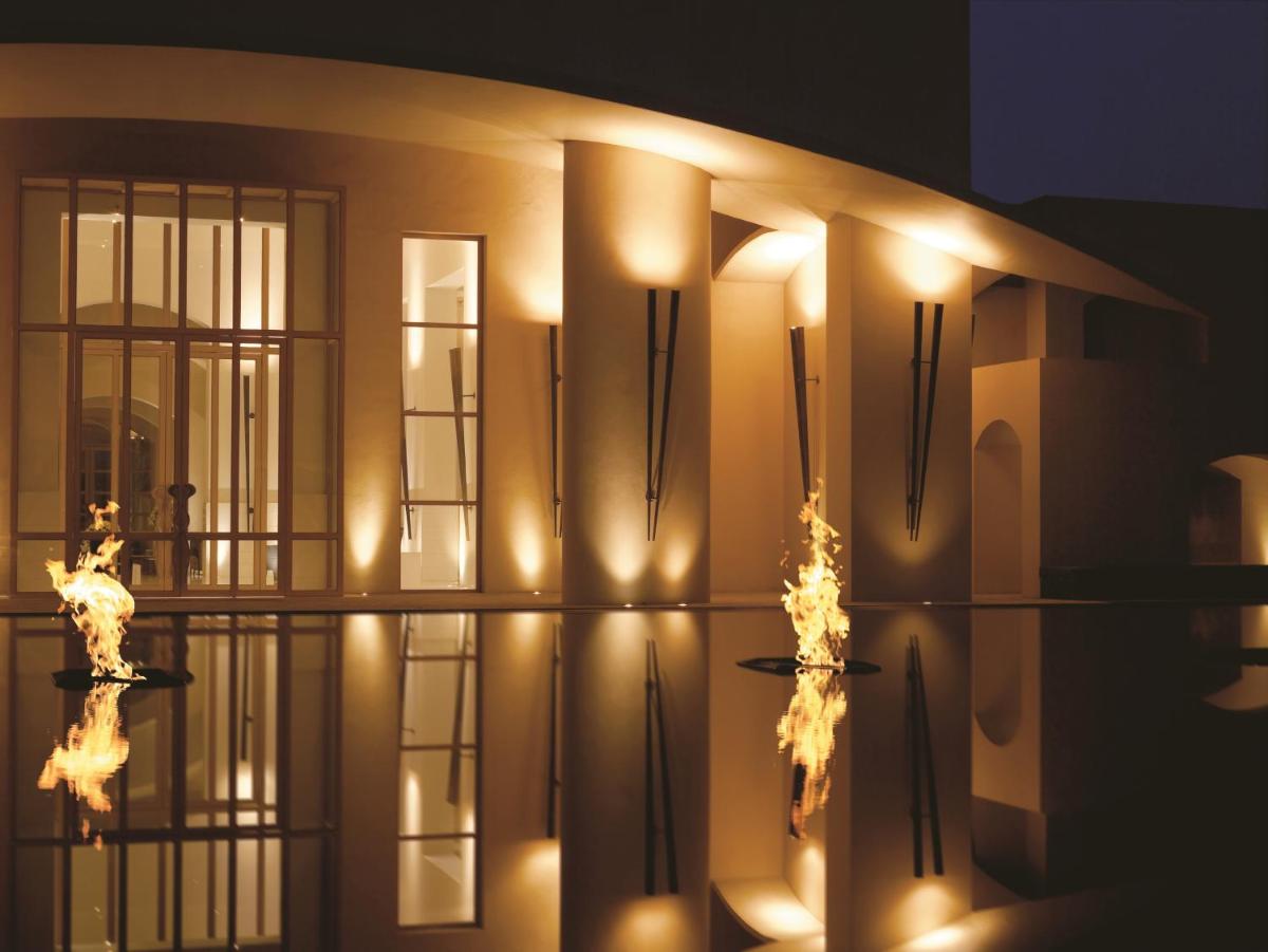 a building with lights on the side of it at Trident Gurgaon in Gurgaon