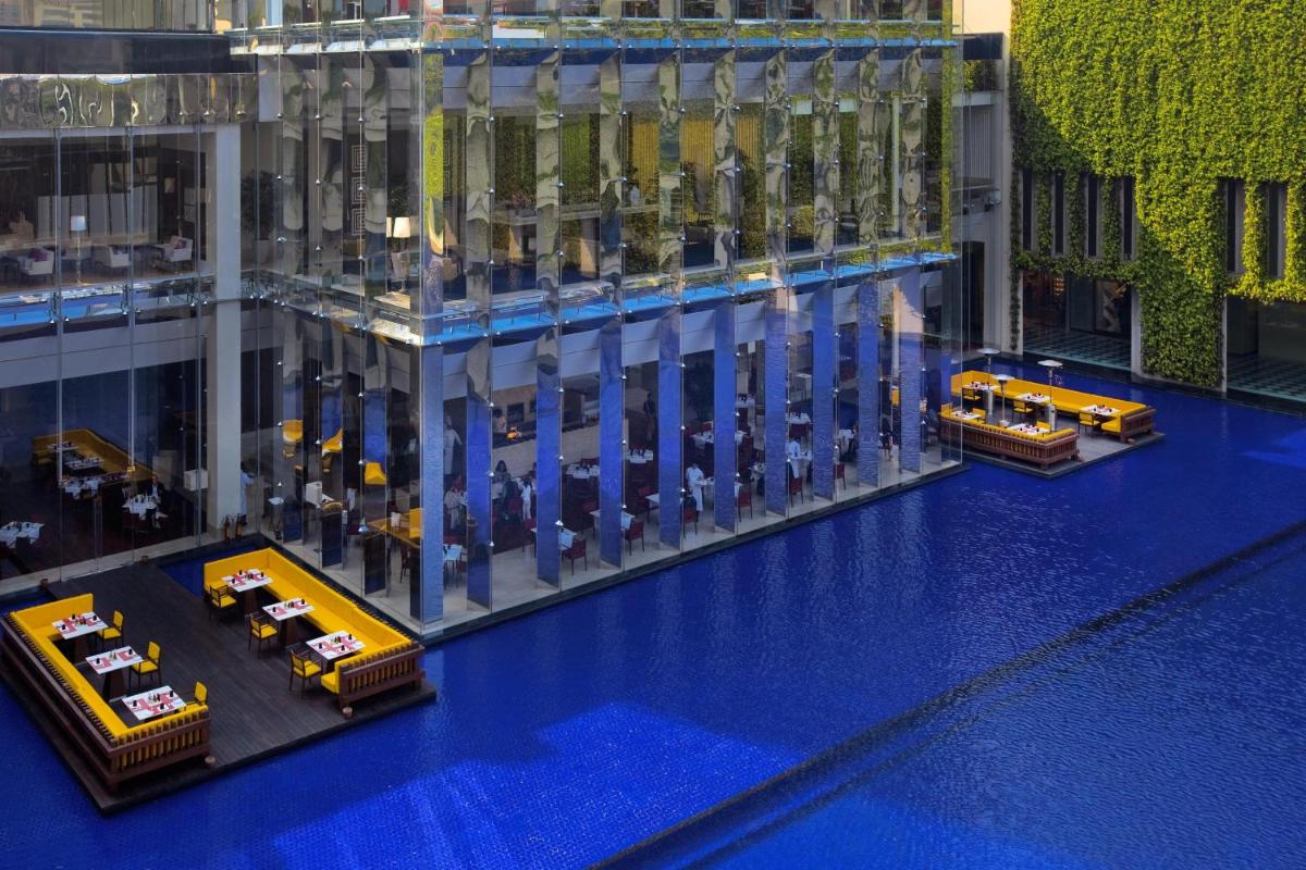 a lego model of a large building with tables at The Oberoi Gurgaon in Gurgaon