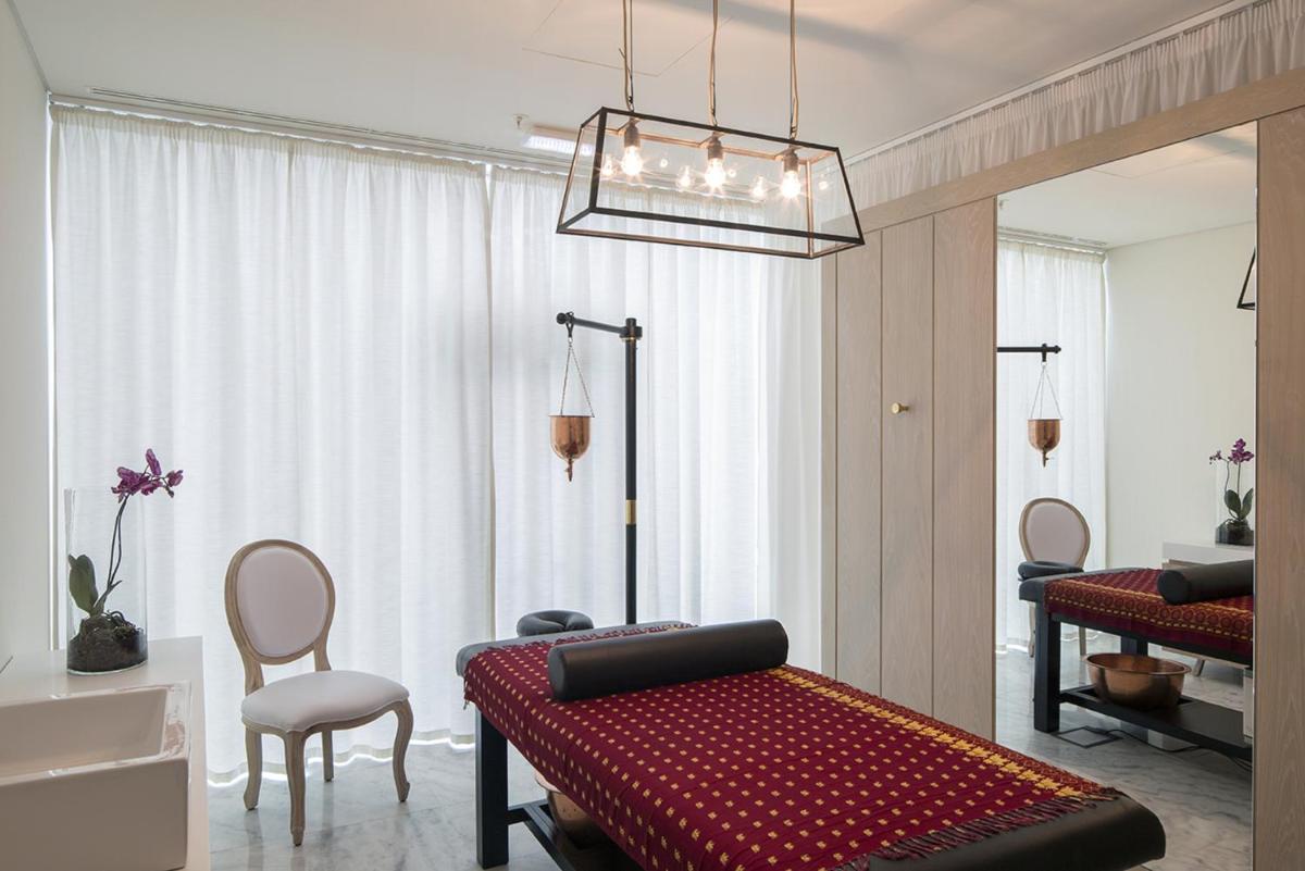 Uma cama ou camas num quarto em Royal Obidos Scenic Resort
