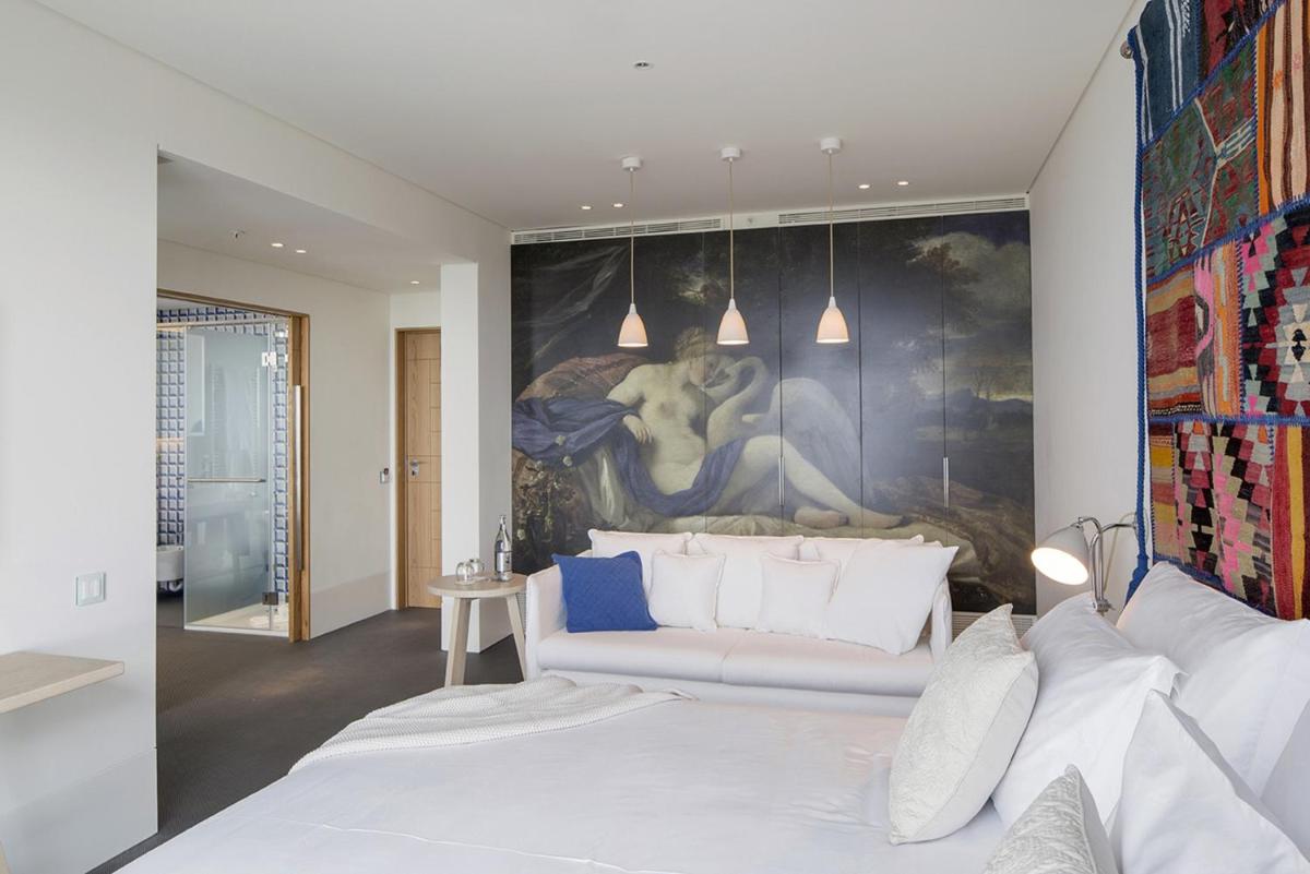 Uma cama ou camas num quarto em Royal Obidos Scenic Resort