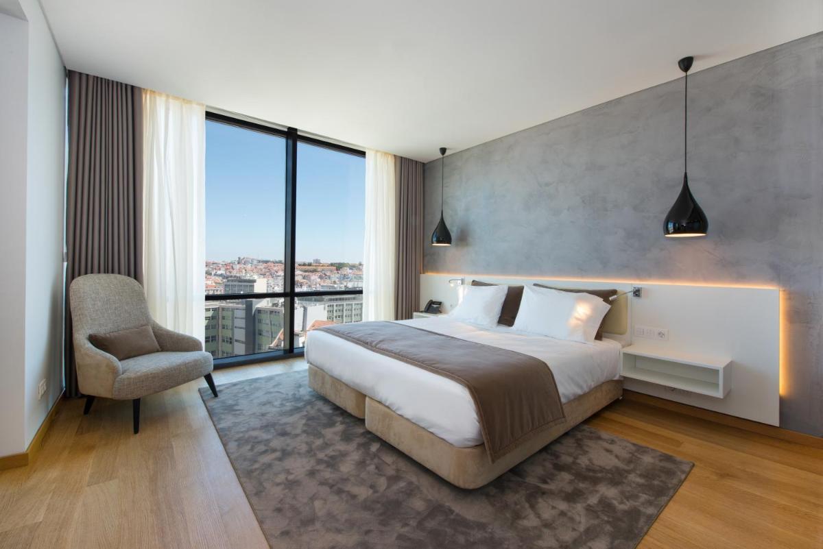 Uma cama ou camas num quarto em Iberostar Selection Lisboa