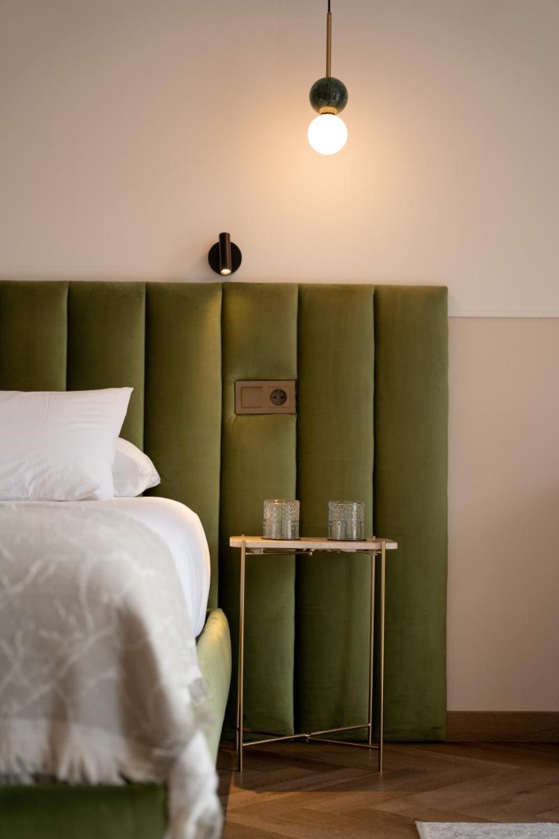 Cama o camas de una habitación en Hotel Boutique Las Indianas