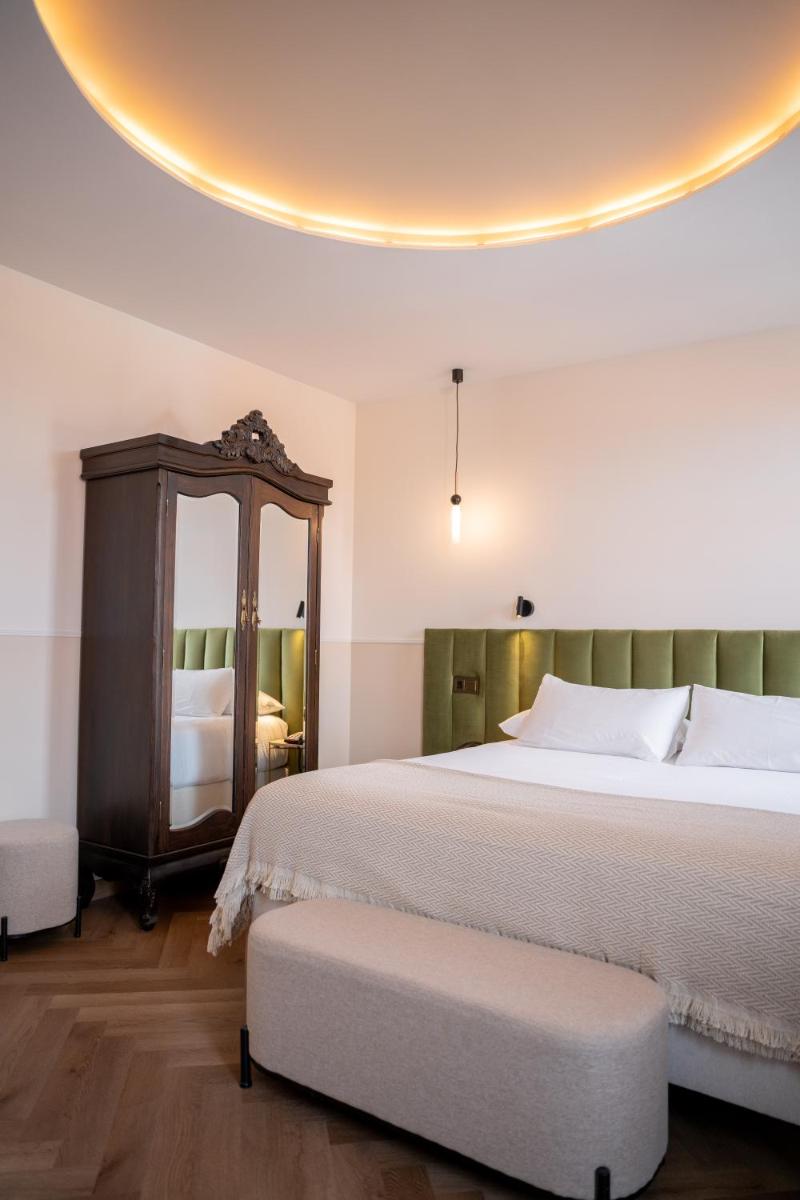 Cama o camas de una habitación en Hotel Boutique Las Indianas
