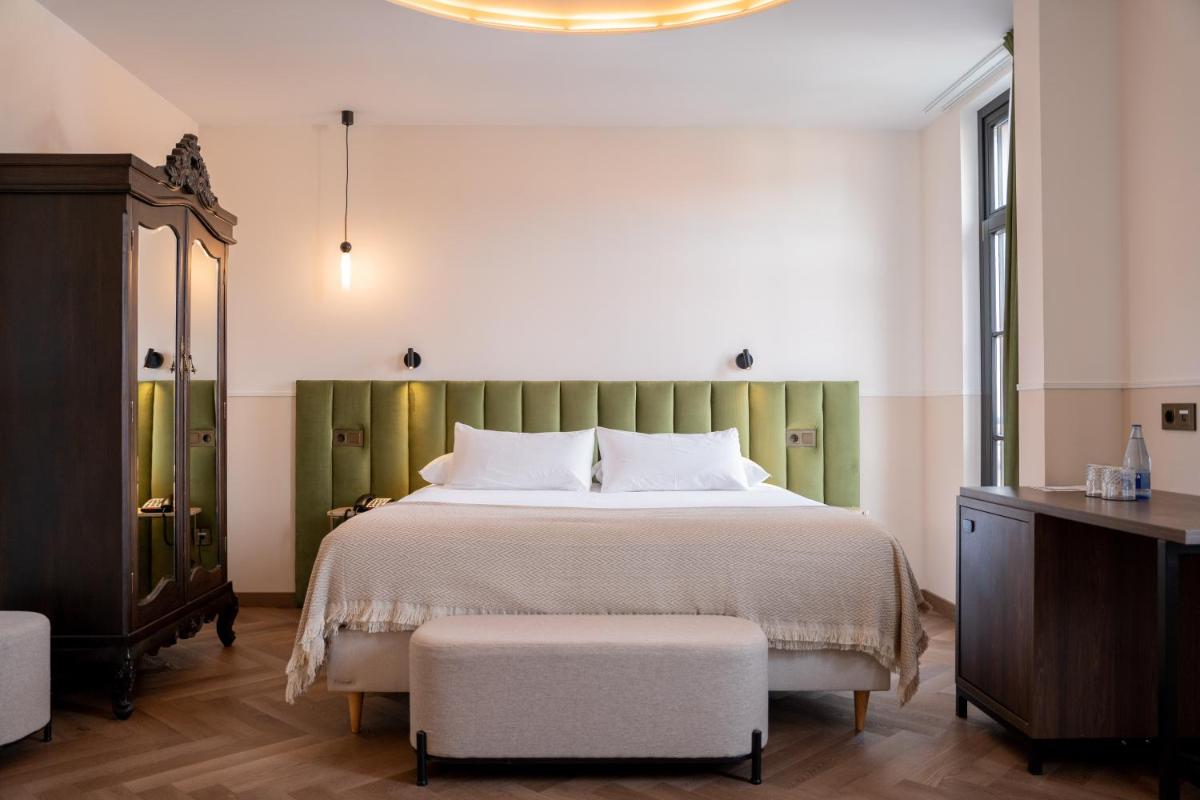 Cama o camas de una habitación en Hotel Boutique Las Indianas