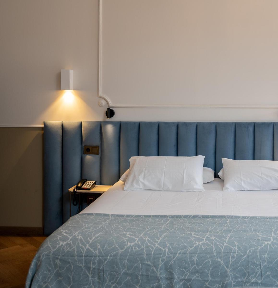 Cama o camas de una habitación en Hotel Boutique Las Indianas