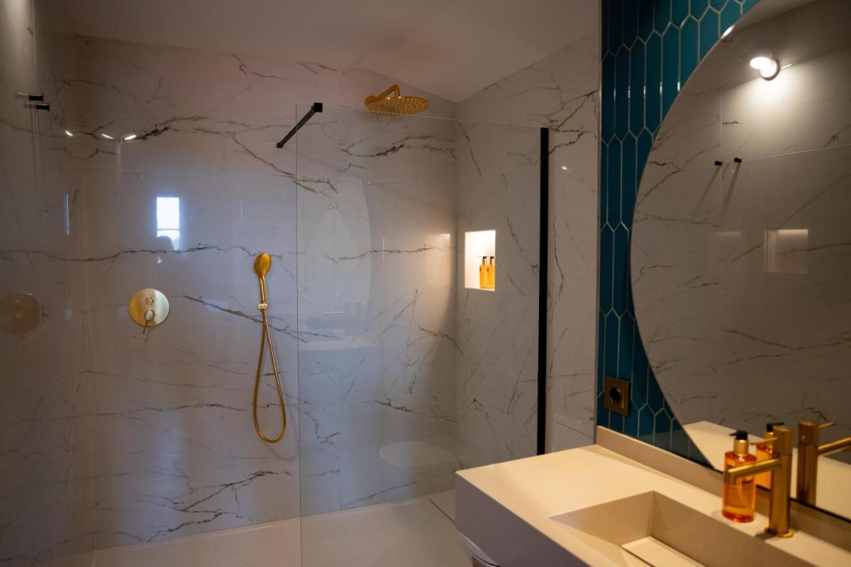 Un baño de Hotel Boutique Las Indianas