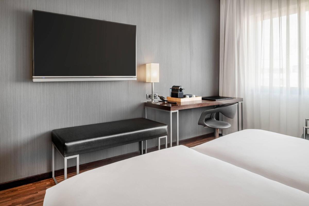 Cama o camas de una habitación en AC Hotel San Sebastián de los Reyes by Marriott