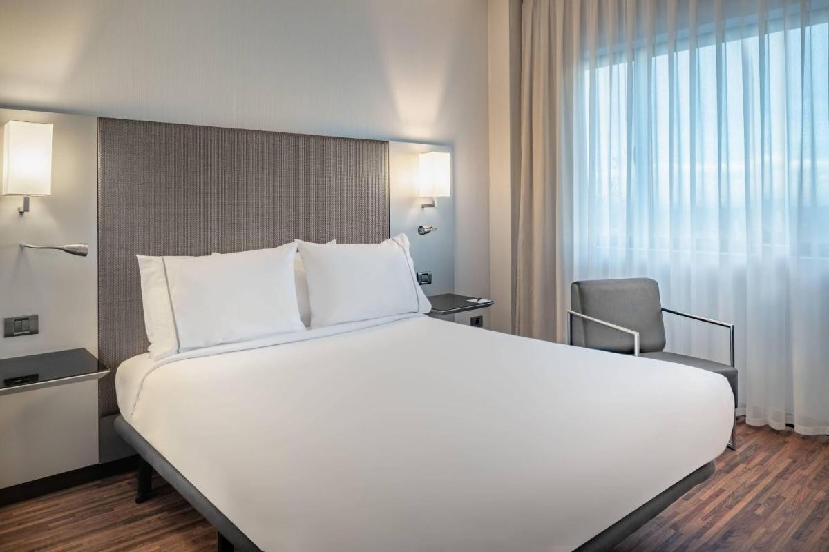 Cama o camas de una habitación en AC Hotel San Sebastián de los Reyes by Marriott
