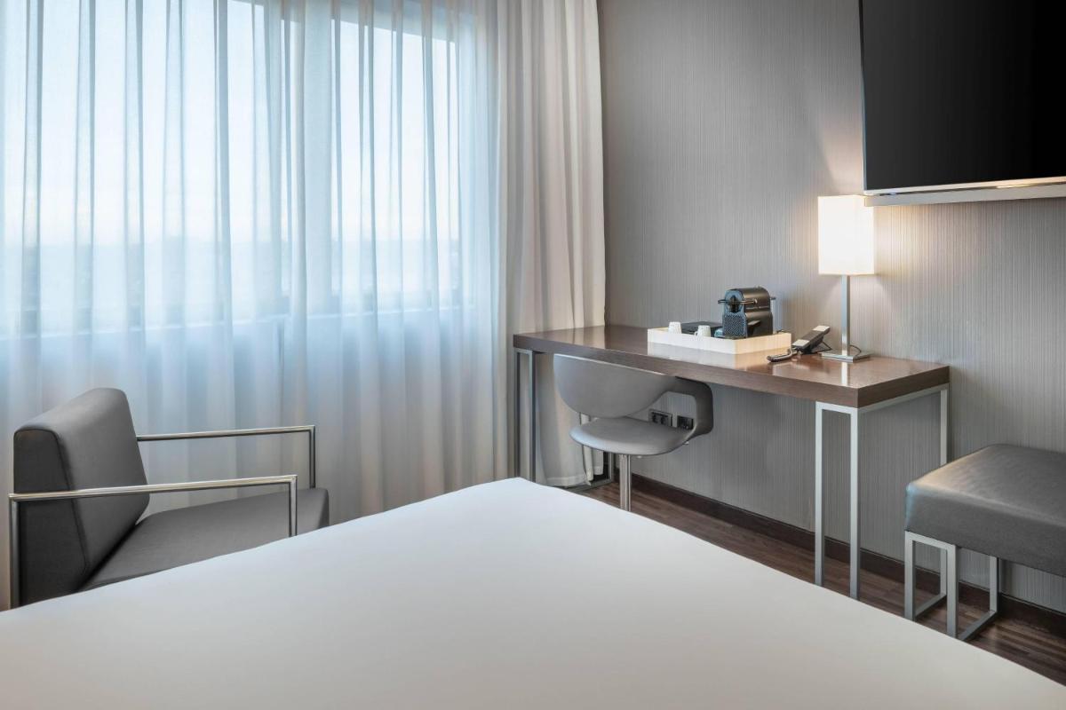 Cama o camas de una habitación en AC Hotel San Sebastián de los Reyes by Marriott