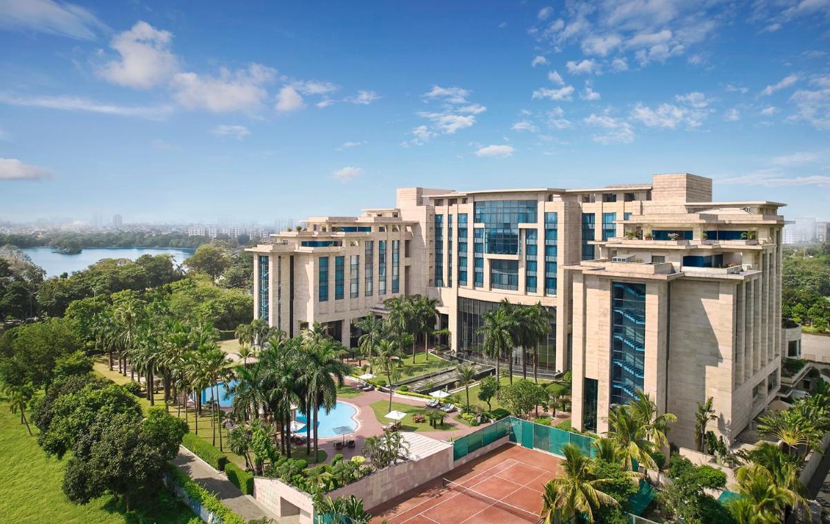 an aerial view of a resort with a swimming pool at Hyatt Regency Kolkata in Kolkata an aerial view of a resort with a swimming pool at Hyatt Regency Kolkata in Kolkata