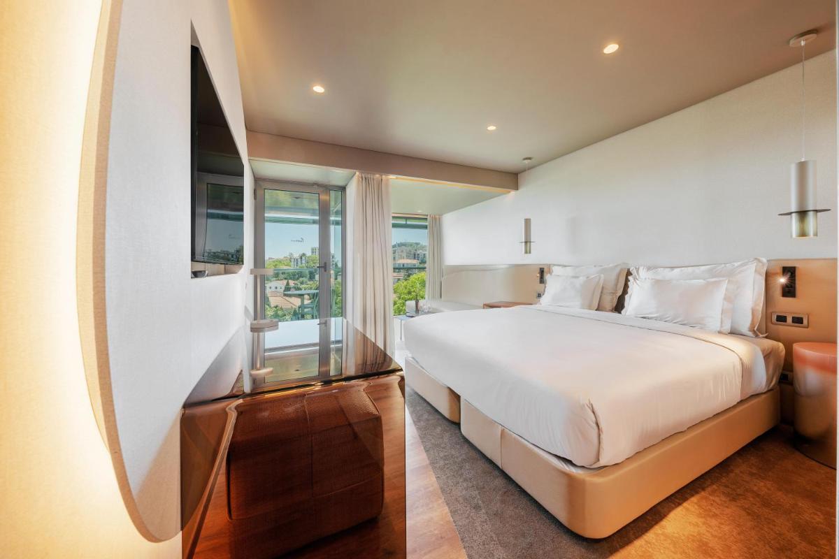 Uma cama ou camas num quarto em The Views Baia - Adults Only