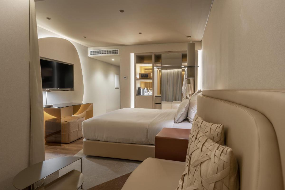 Uma cama ou camas num quarto em The Views Baia - Adults Only