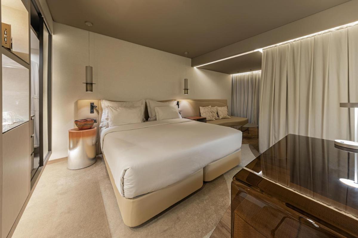 Uma cama ou camas num quarto em The Views Baia - Adults Only
