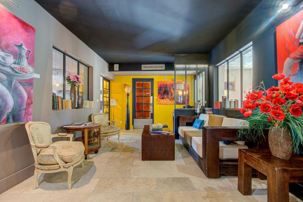 Coin salon dans l'établissement Hotel Bastide & SPA - Villa de Lourmarin