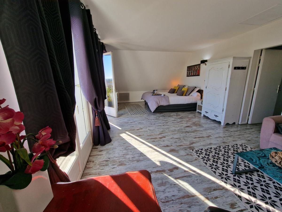 Un ou plusieurs lits dans un hébergement de l'établissement Les Terrasses de Saumur - Hôtel & Appartements - Restaurant & Spa (Logis)