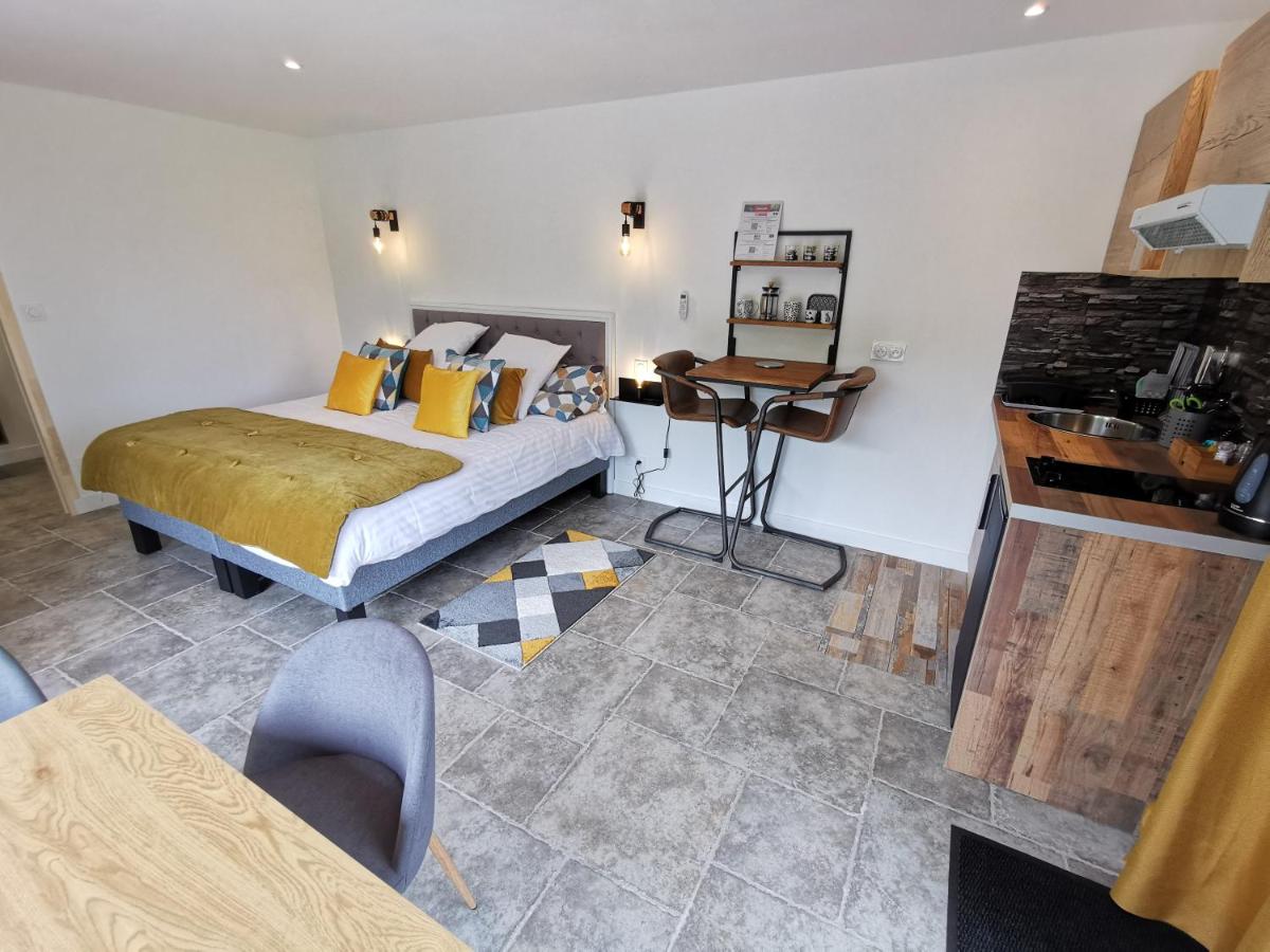 Un ou plusieurs lits dans un hébergement de l'établissement Les Terrasses de Saumur - Hôtel & Appartements - Restaurant & Spa (Logis)