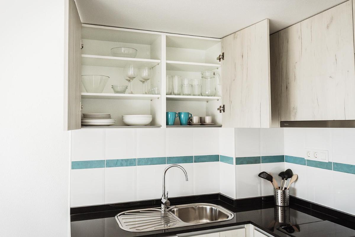 Una cocina o zona de cocina en Nacavi Albir Aparthotel