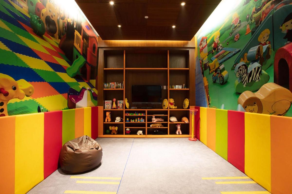 a childs room with colorful walls and a tv at Hyatt Regency Amritsar Hotel & Spa in Amritsar
