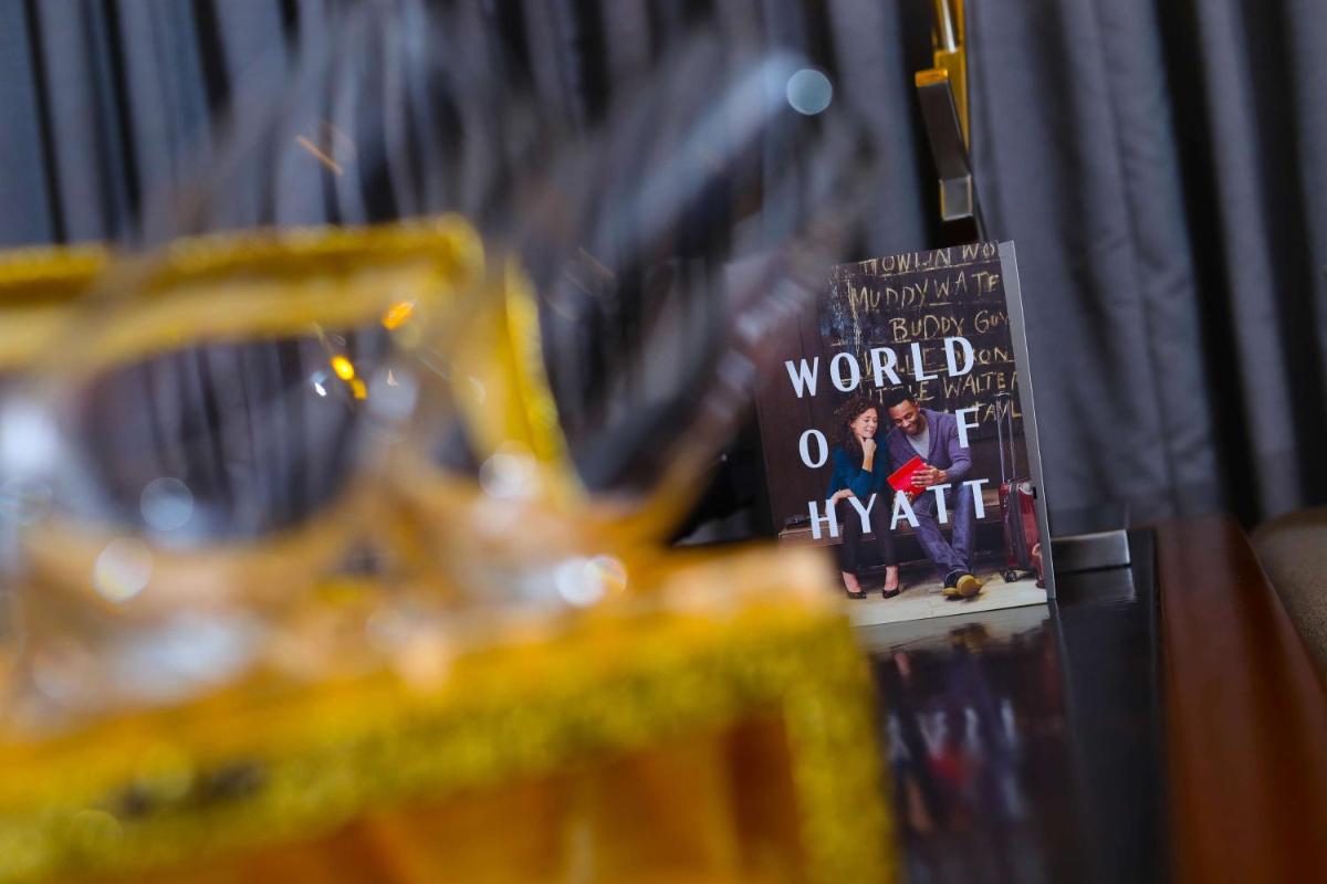 a sign that says world of inquiry sitting on a table at Hyatt Regency Amritsar Hotel & Spa in Amritsar