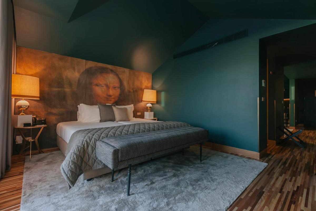 Uma cama ou camas num quarto em Torel Avantgarde