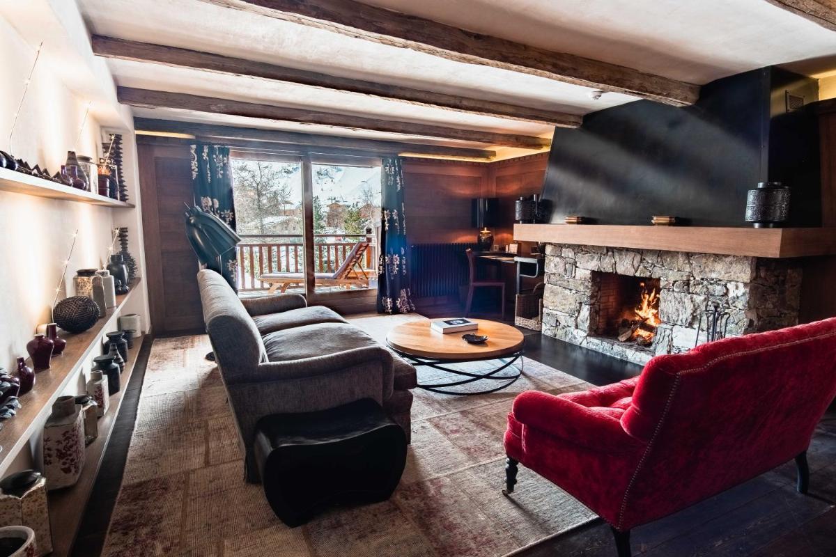Coin salon dans l'établissement Hôtel LE BLIZZARD
