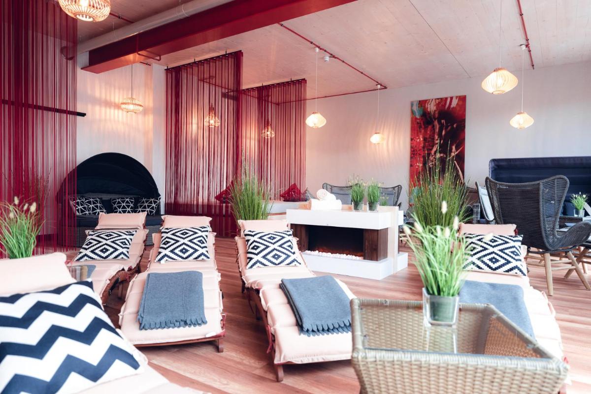 Ein Sitzbereich in der Unterkunft Hotel BEI SCHUMANN