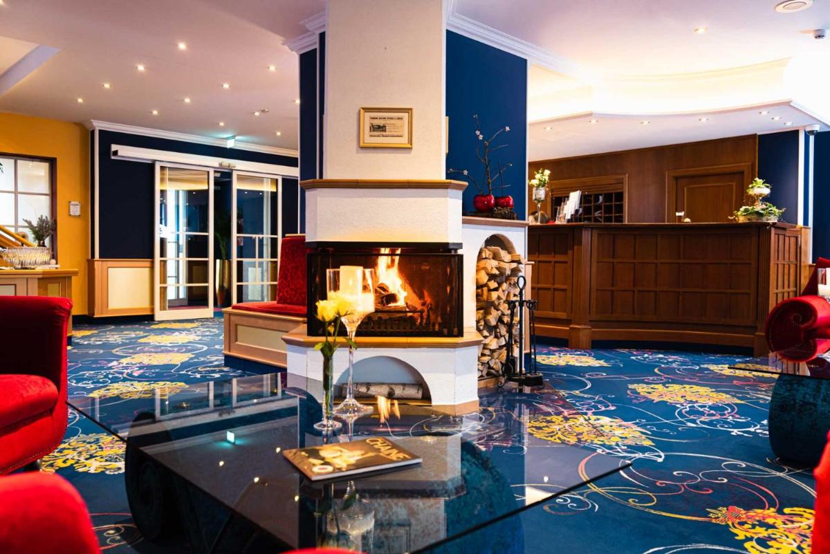 Ein Sitzbereich in der Unterkunft Hotel BEI SCHUMANN