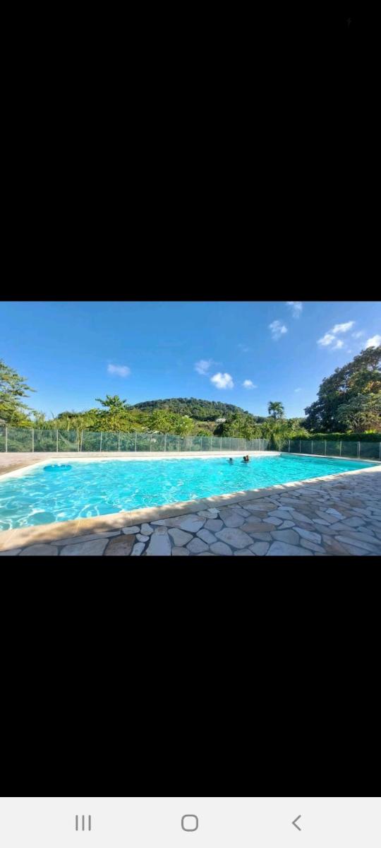 La Perle du Rorota-Studio de standing avec piscine & plage - Housity