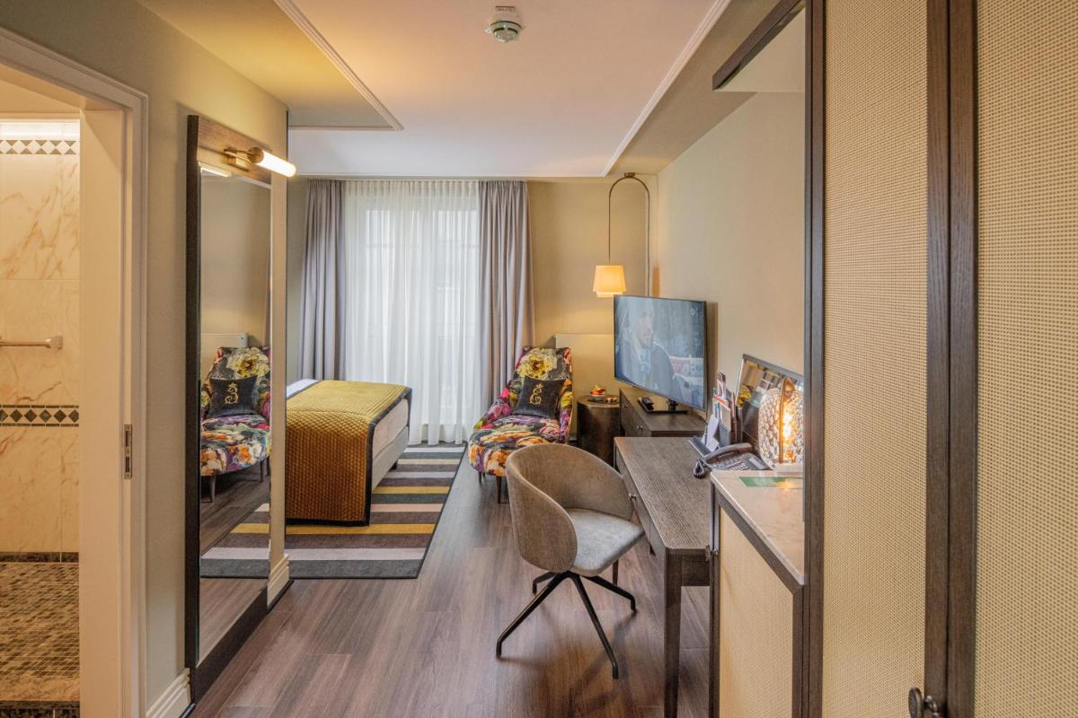 TV/Unterhaltungsangebot in der Unterkunft Hotel Erbprinz - Gourmet & Spa