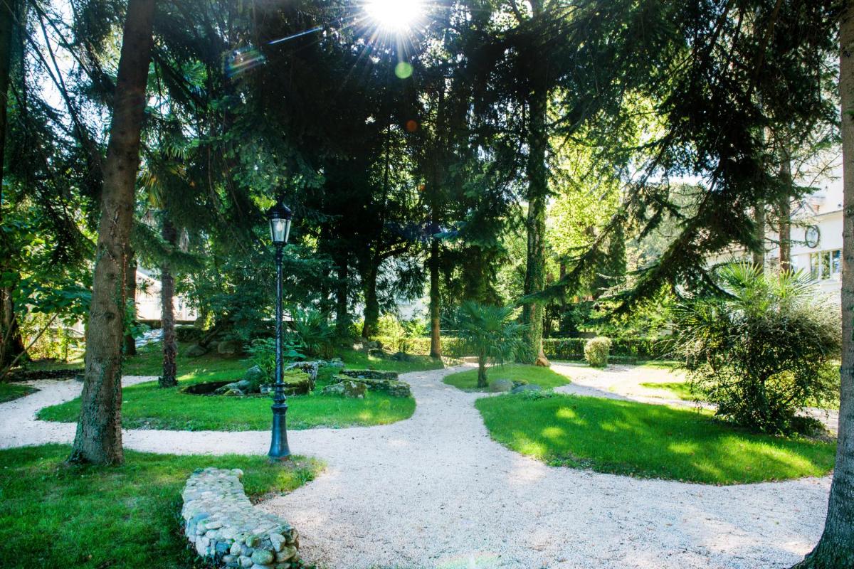 Jardin de l'établissement Grand Hotel Gallia & Londres