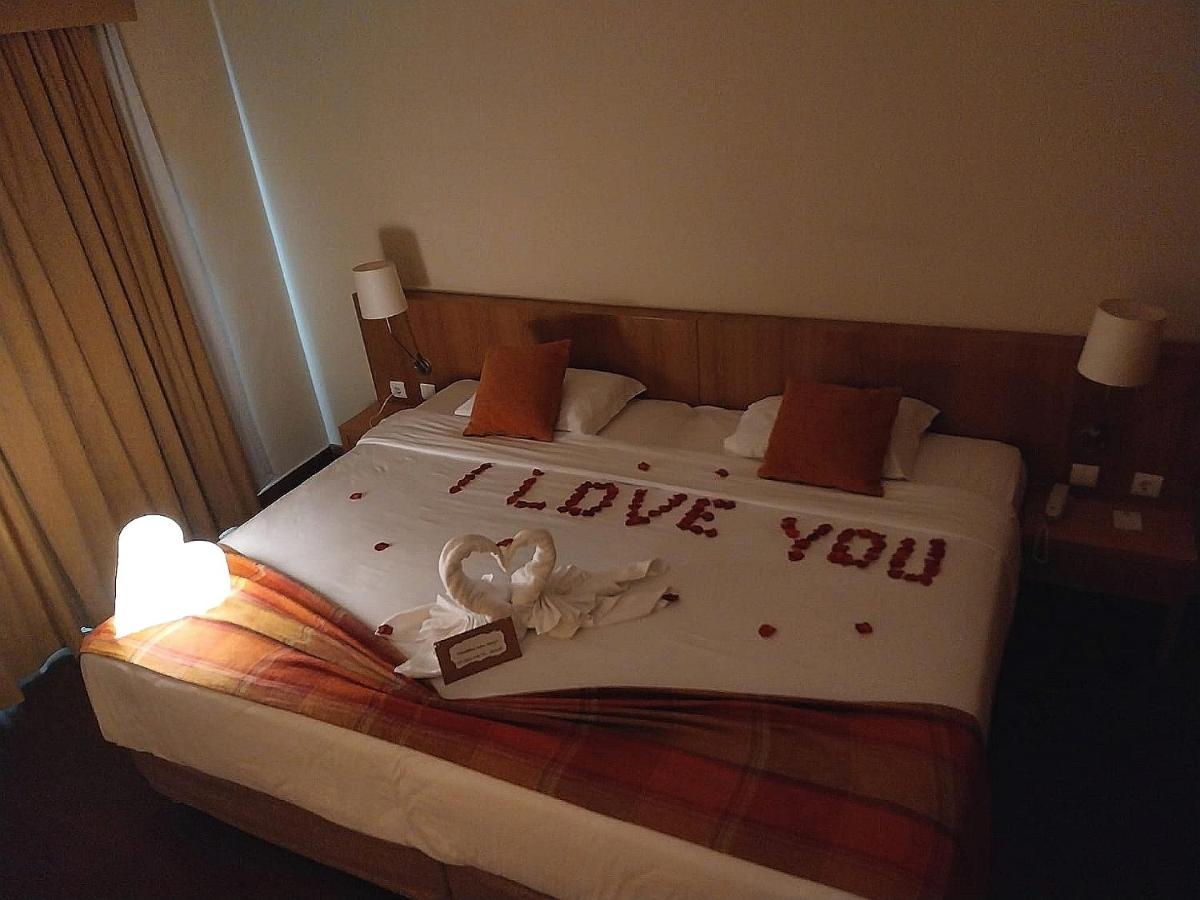 Uma cama ou camas num quarto em Hotel Da Montanha