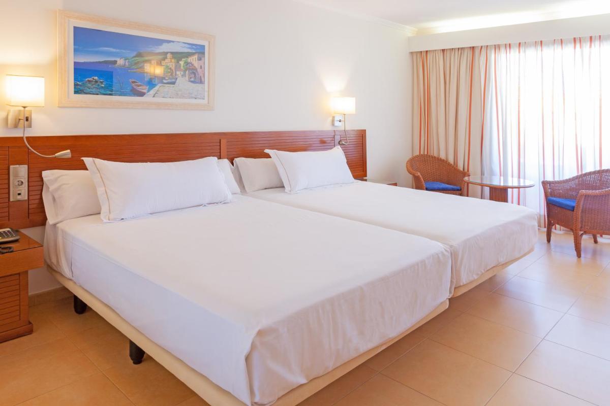 Cama o camas de una habitación en Playamarina