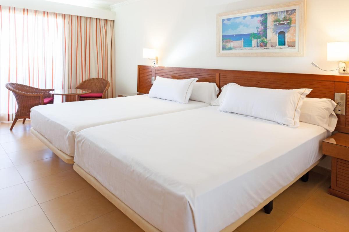 Cama o camas de una habitación en Playamarina
